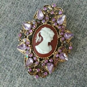 Elegant Cameo Brooch with Inlaid Purple Gems